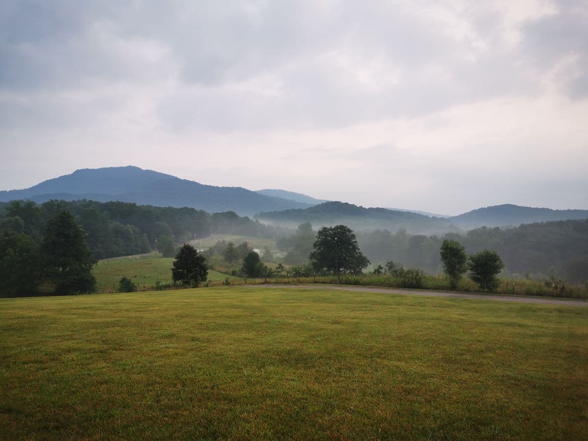 Misty green foothills and pasture in the Virginia countryside